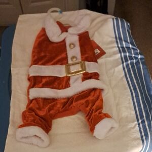 New with tags. Festive Red Dog Santa Suit size small
